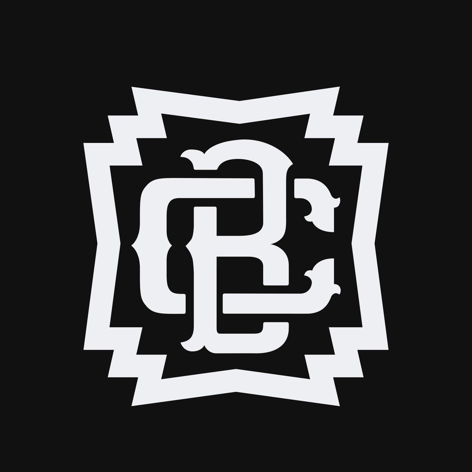 A white, stylized monogram with the letters “C” and “R” intertwined inside a bold, jagged-edged square frame, set against a solid black background.