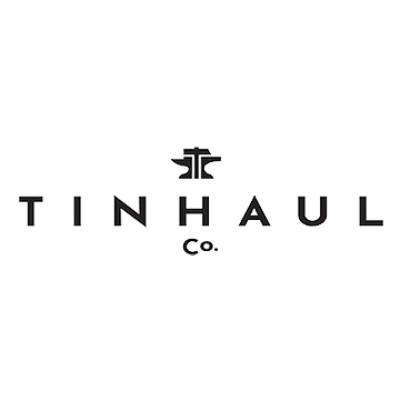 A red outline of an anvil and hammer forms a stylized logo above the words TIN HAUL in bold, black uppercase letters.