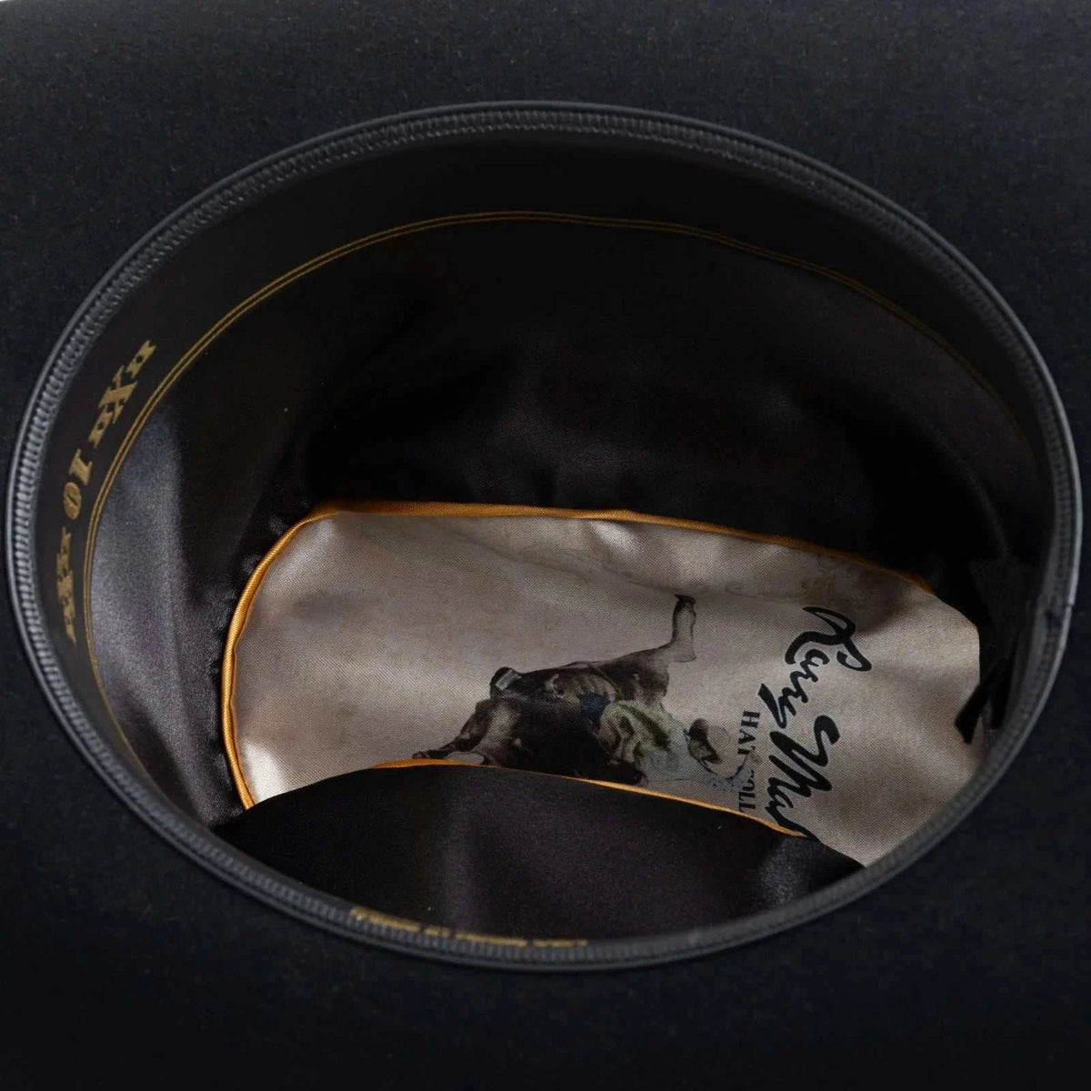 Black 10x Larry Mahan Jerarca fur felt cowboy hat with cattleman crease and decorative buckle