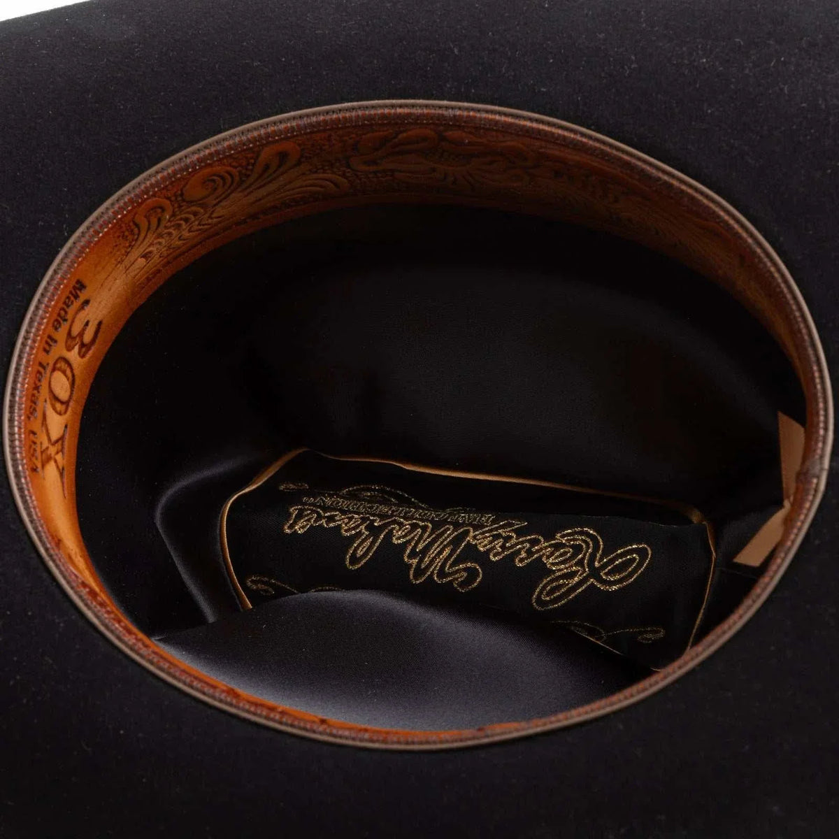 30x Larry Mahan Opulento black fur felt cowboy hat with 4 1/2" crown and 4" brim, cattleman crease, gold buckle, and leather sweatband