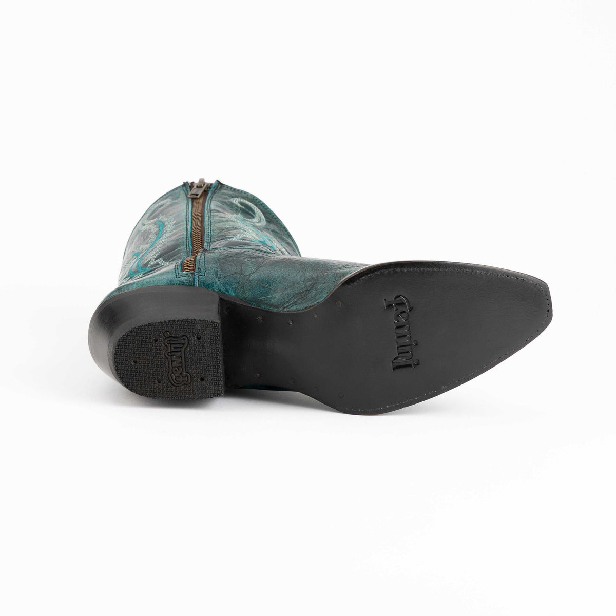 Ferrini Molly Leather Booties in teal leather with swirling stitched patterns, side zipper, and black leather outsole