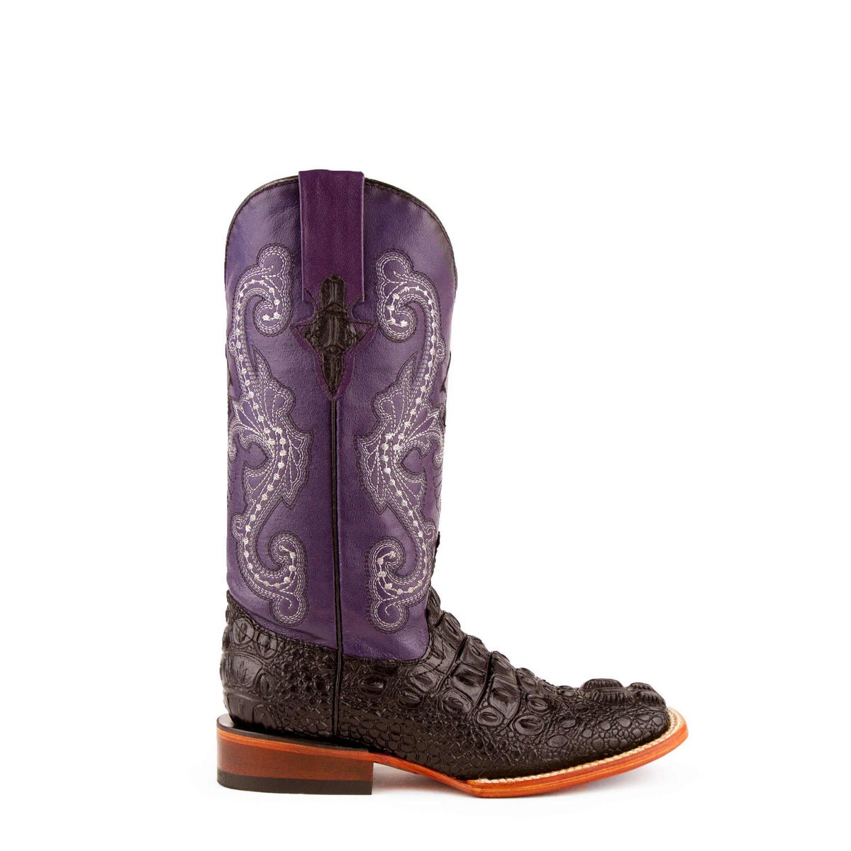 Ferrini Rancher Caiman Print Boots feature a dark embossed caiman-print vamp, purple embroidered shaft, square toe and orange-edged sole.