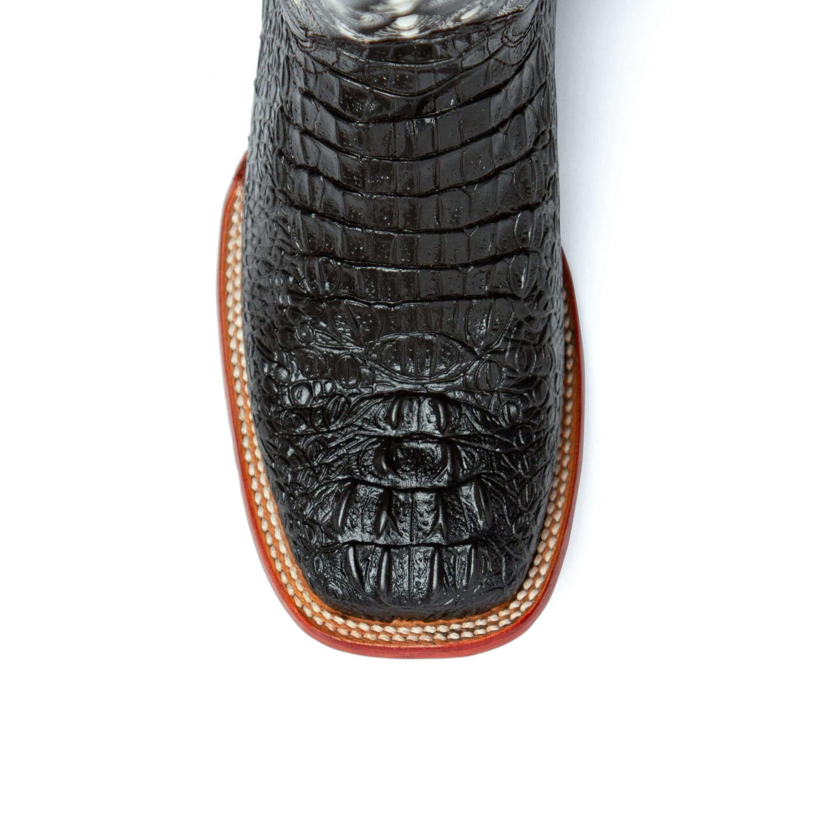 Ferrini Stampede boot in black with embossed caiman crocodile-scale pattern and tan contrast stitching around the toe
