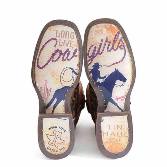 Women's Tin Haul cowboy boots with brown leather uppers and colorful Long Live Cowgirls soles featuring cowgirl and horse artwork