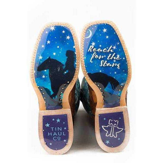 Women's Tin Haul Wish Upon A Star Boots with blue starry soles, cowboy silhouettes, tan leather trim and branded heel panels