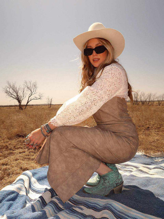 Women's Corral Turquoise Python Boots with turquoise patterned scales, pointed toes, and stacked heels worn with a western outfit