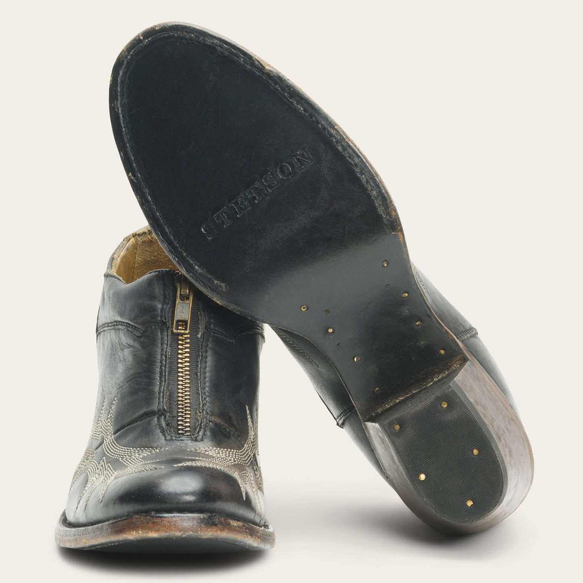 Black women's Stetson Nicole leather boots with front zipper