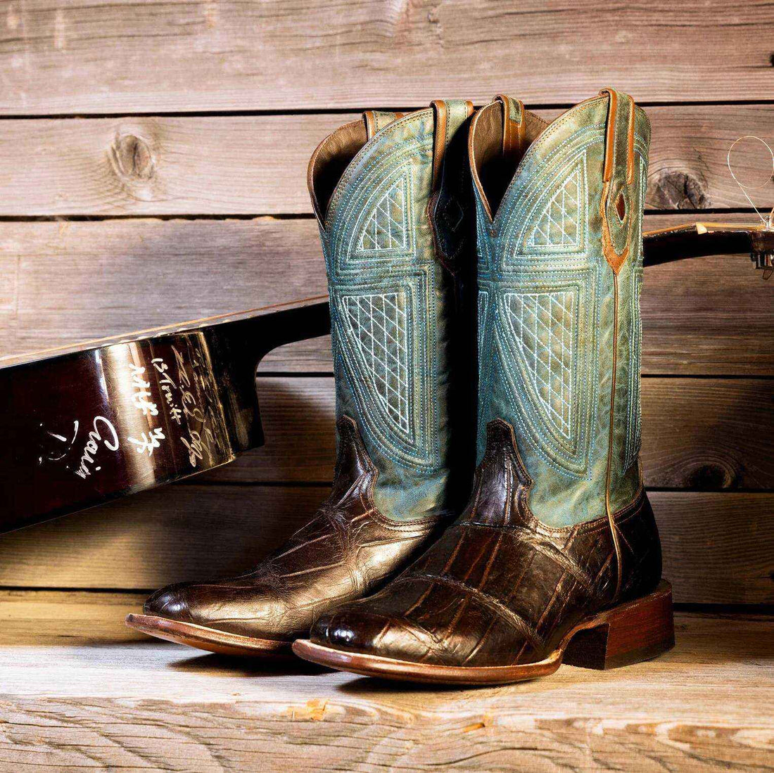 Close-up of skilled hands crafting authentic Stetson boots with detailed leatherwork