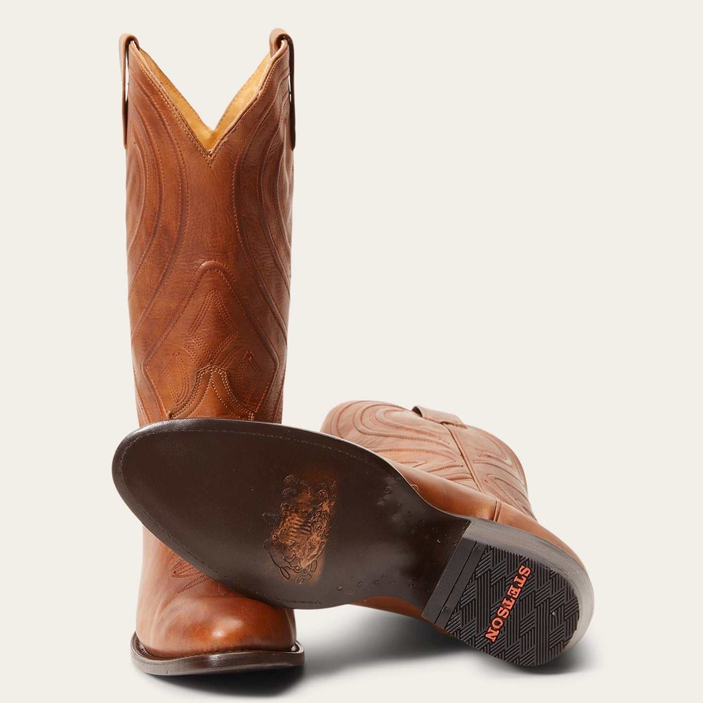 Men's Stetson Mossman Roper handcrafted brown leather boots with burnished cognac vamp and black corded shaft