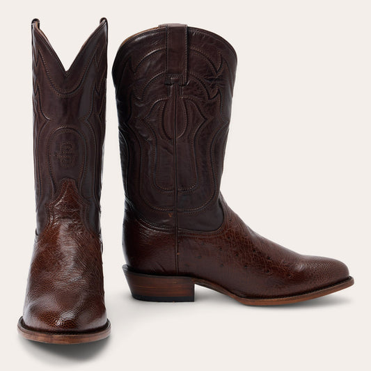 The Mens Stetson Wyatt Smooth Ostrich Boots in Tobacco feature a handcrafted round toe and elegant stitching, reflecting American heritage. Displayed against a white background. Brand: Stetson Boots.