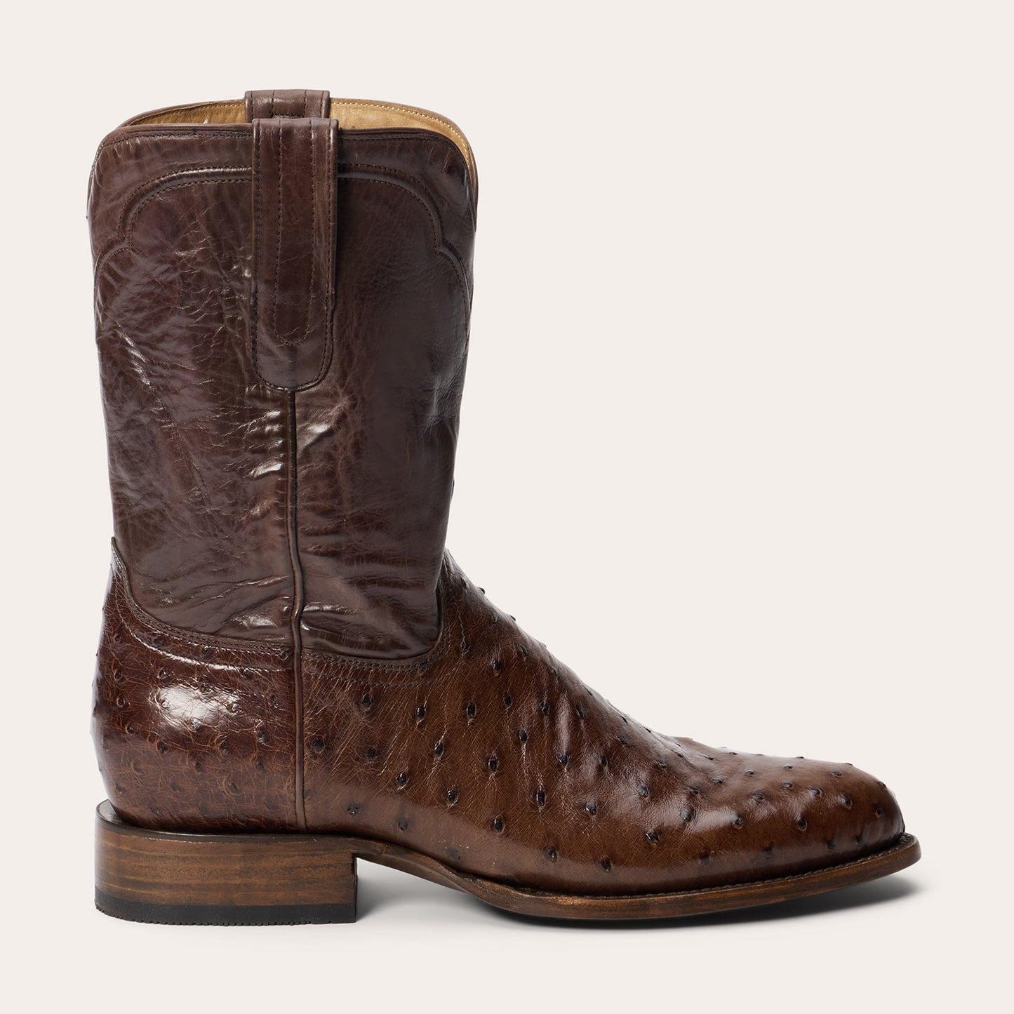 Top, bottom, and side views of the TRU-X insole for Mens Stetson Austin Ostrich Boots. It offers dual density, gel pads, performance fabric, antimicrobial protection, and a deep heel cup—true to American heritage.
