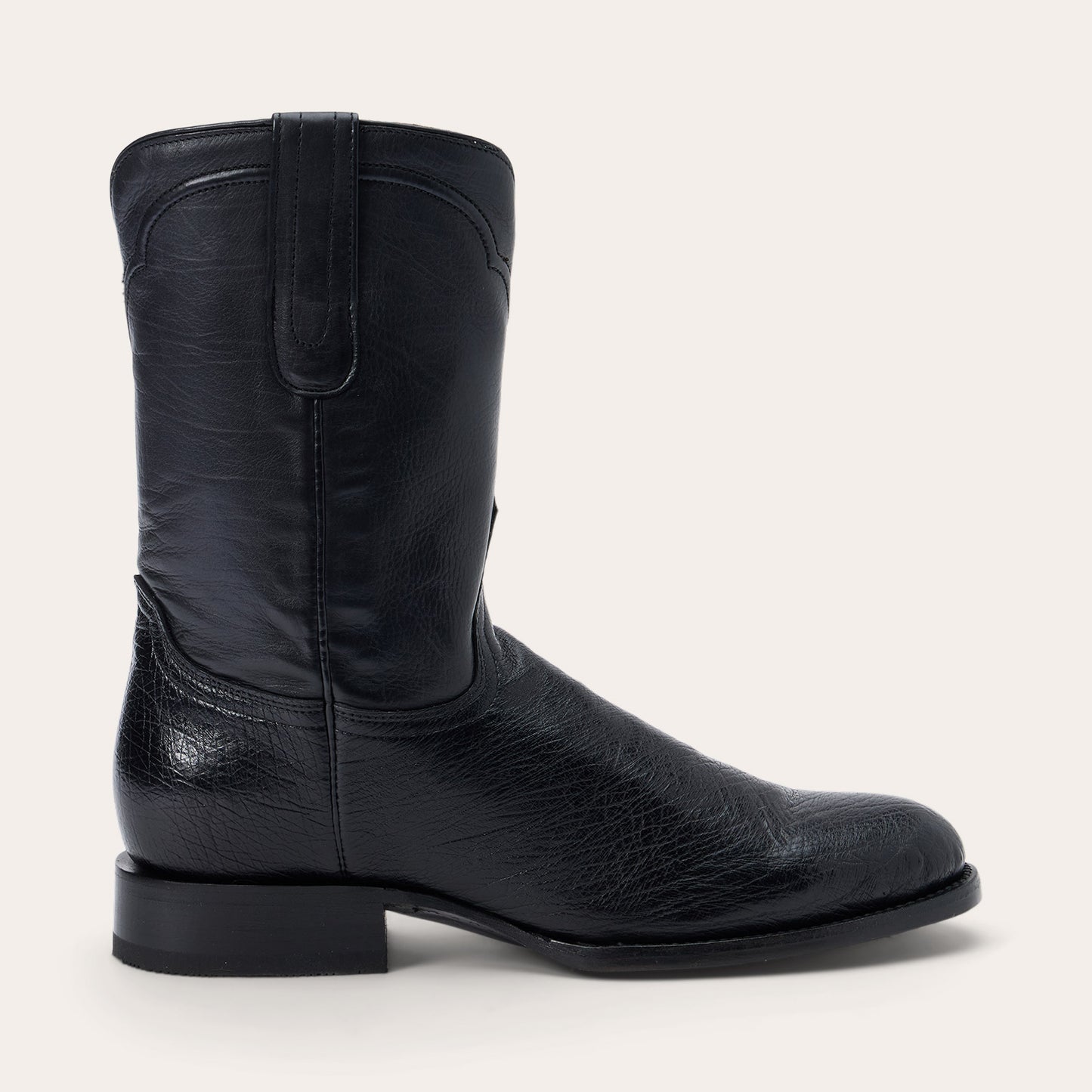 Three views of the Tru-X insole for Mens Stetson Clay Ostrich Boots in black show its top, bottom, and side. Made by Stetson Boots, it features high-density foam, gel pads, a deep heel cup, durability, support, and antimicrobial protection.