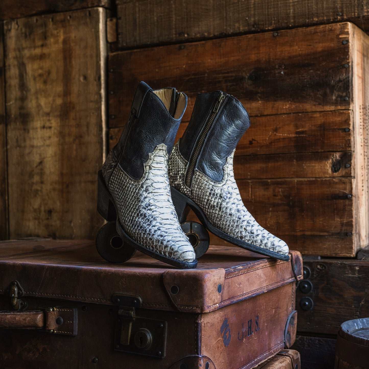 Women's Stetson Sydney Python Boots with natural python vamp and 7-inch black shaft, handcrafted with leather sole and cushioned insole