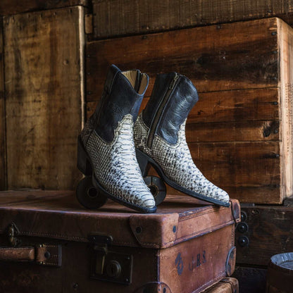 Women's Stetson Sydney Python Boots with natural python vamp and 7-inch black shaft, handcrafted with leather sole and cushioned insole