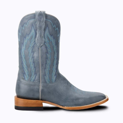 Western cowboy boot in slate blue leather with blue embroidered shaft, medium square toe, spur ledge and stacked heel