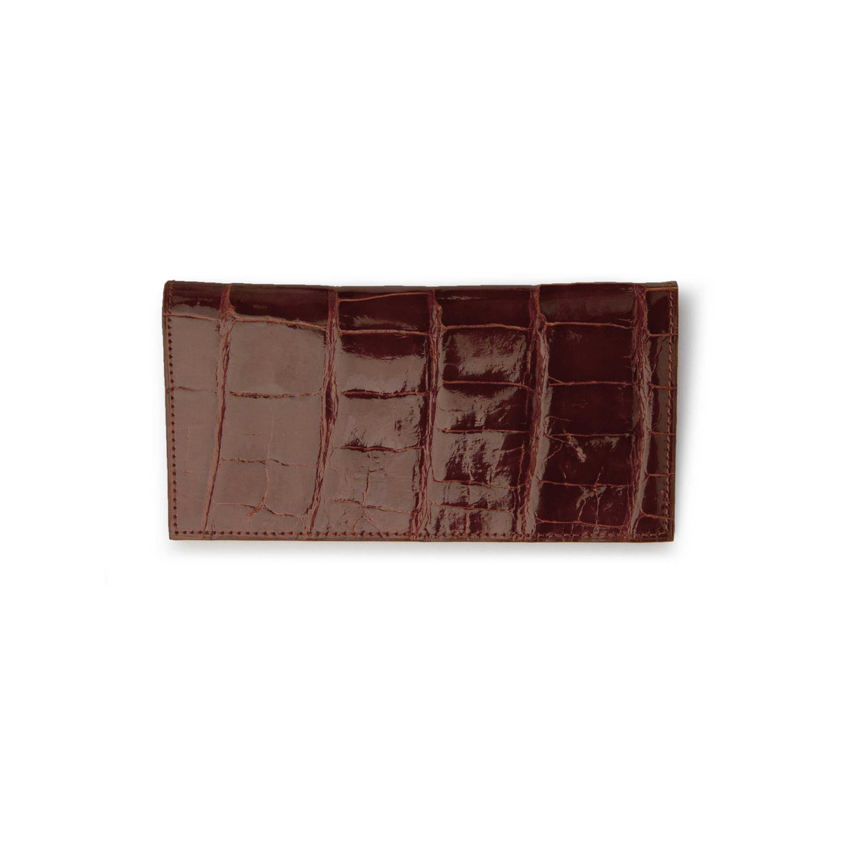 Ferrini Alligator Checkbook Cover in cognac alligator leather, opened to show glossy embossed scales and multiple card slots