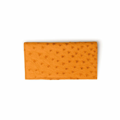 Checkbook cover in buttercup yellow-orange Ferrini Full Quill Ostrich leather, with raised quill bumps and stitched edges.