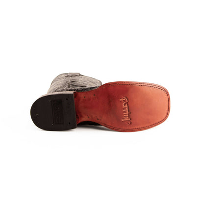 Ferrini Stampede cowboy boot showing a smooth reddish-brown leather sole, stamped Ferrini logo and dark heel