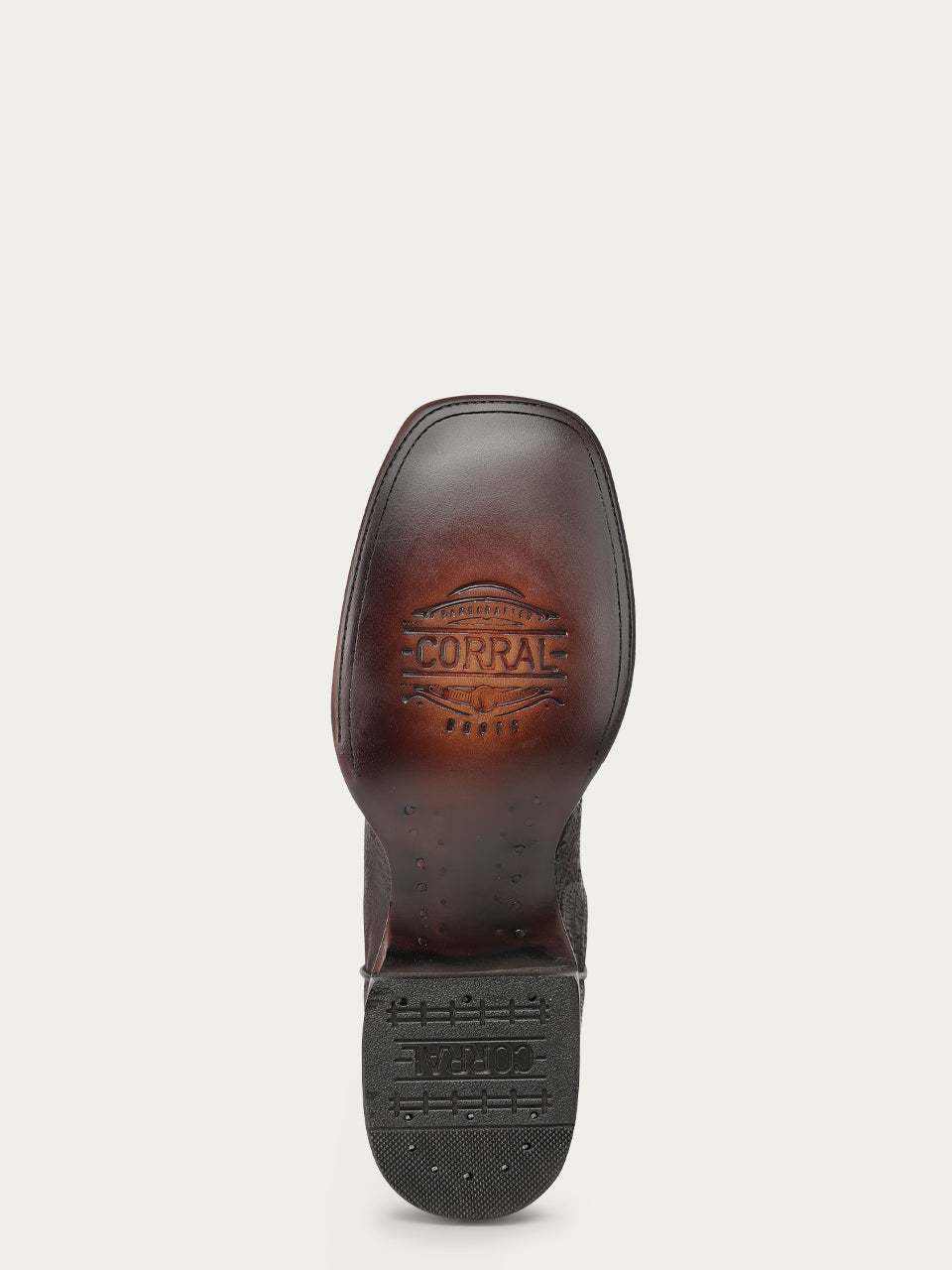 Men's Corral Brown Genuine Ostrich Boots with Patriotic Embroidery showing embossed Corral logo on the brown leather sole and rugged heel