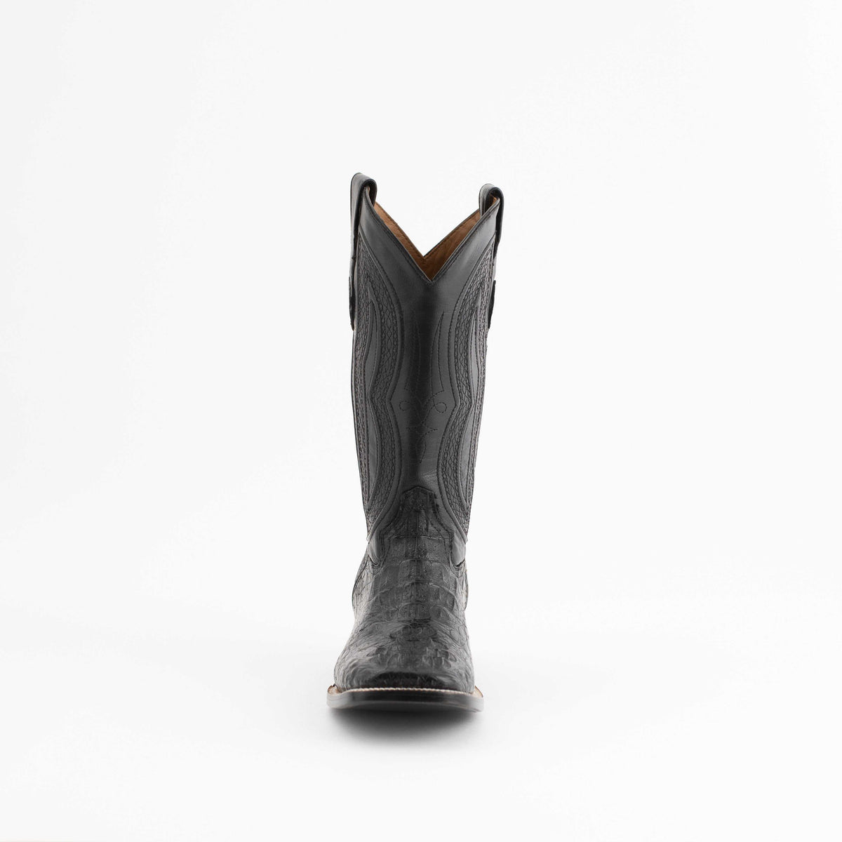 Men's Ferrini Dakota cowboy boot in black caiman hornback leather, showing a textured vamp and pointed toe