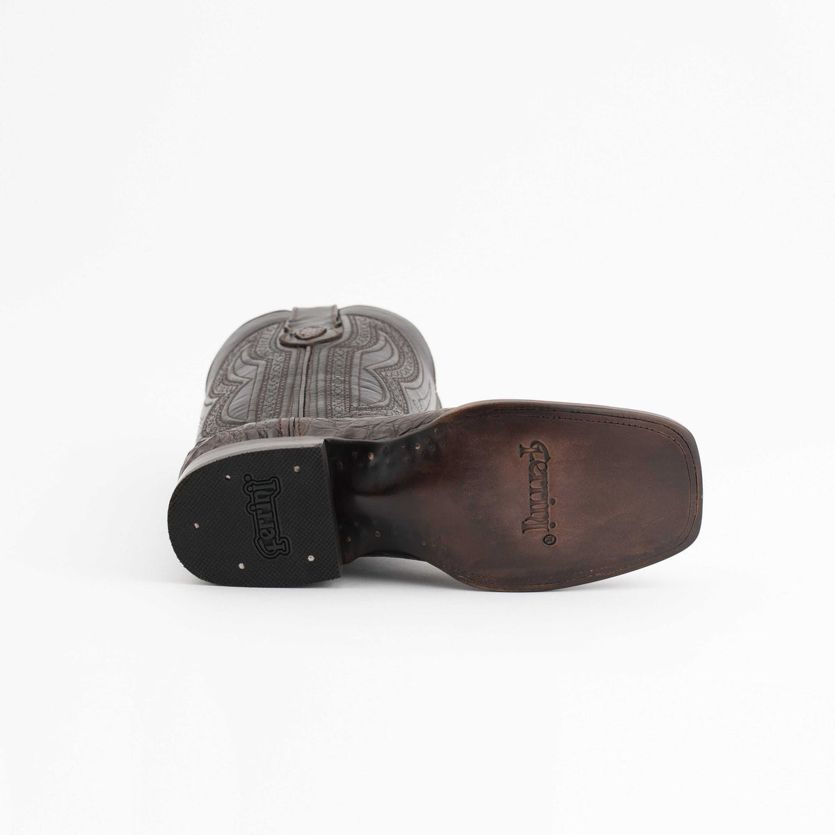 Men's Ferrini Dakota Caiman Hornback Boots with brown leather soles and a dark block heel, embossed with brand marks