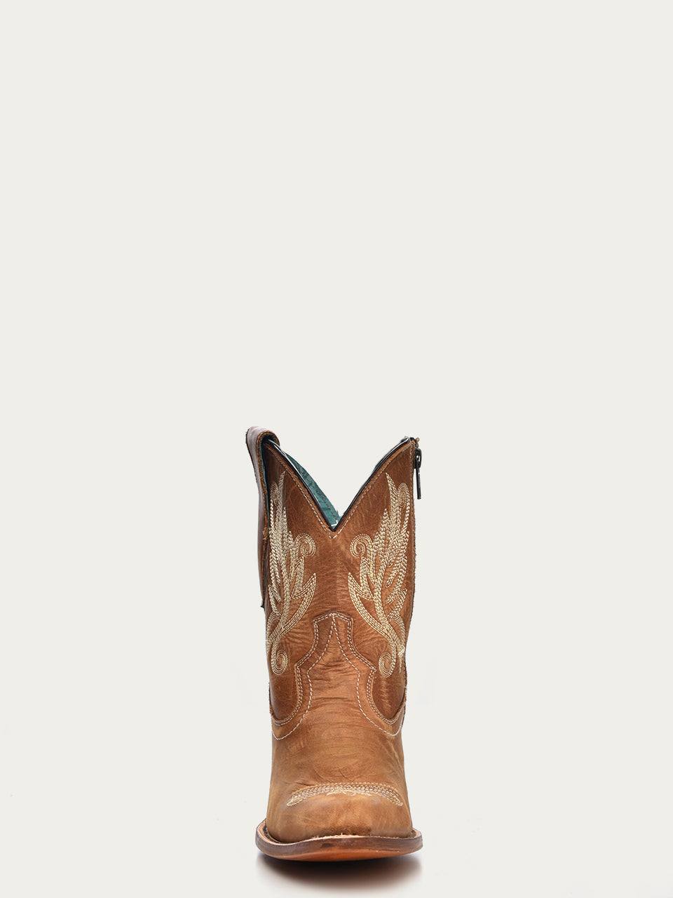 omen's Corral Tan Leather Ankle Boots with Embroidery featuring tan genuine leather, intricate white embroidery, and an 8-inch shaft
