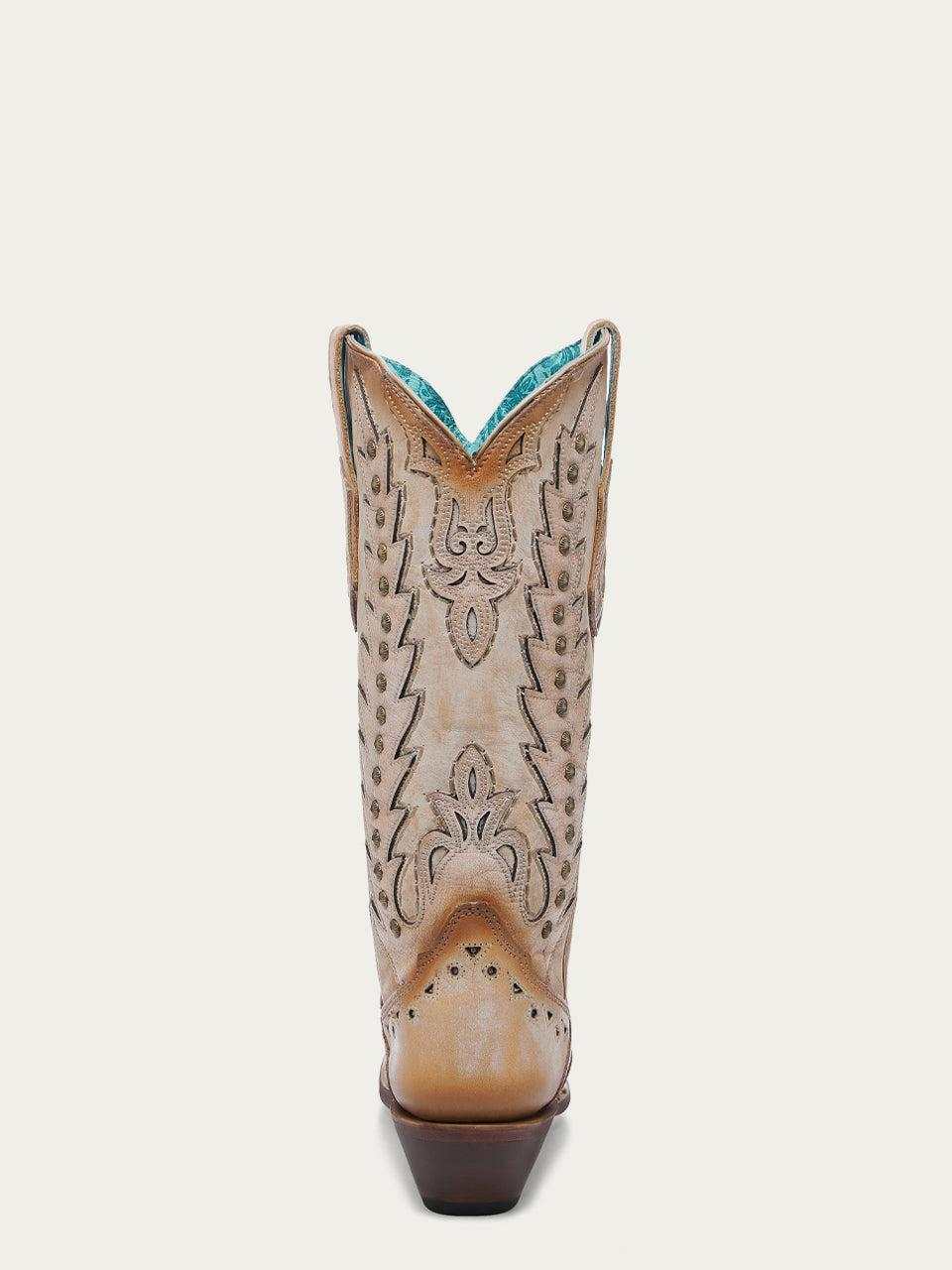 Women's Corral Sand Genuine Leather Boots with Embroidery, showing a tan leather heel with ornate stitching, dark studs, and turquoise lining