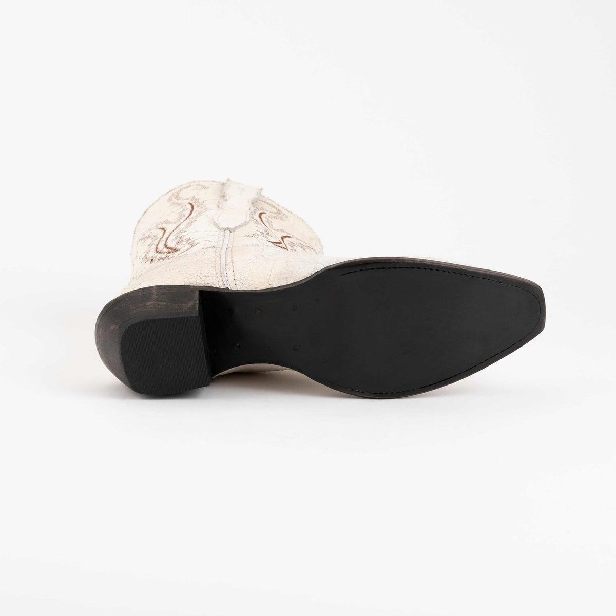 Women's Ferrini Molly Leather Booties showing a black leather outsole, low block heel and white embroidered leather shaft