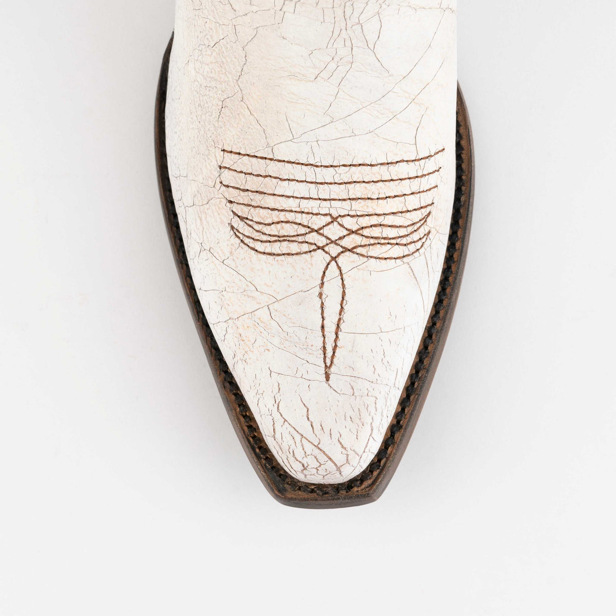 Women's Ferrini Molly Leather Booties in white leather with a pointed toe, brown stitched detailing, and textured finish