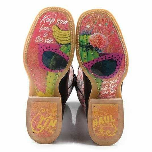 Women's Tin Haul Boots with colorful pink cactus and floral insoles, sunglasses graphics, and brown leather soles