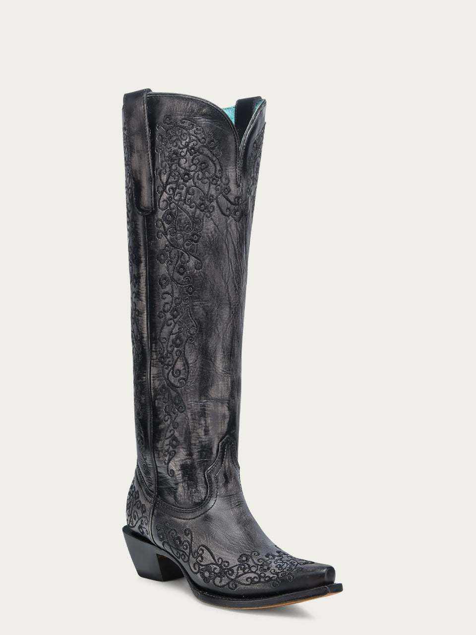 Women's Corral Black Genuine Leather Boots in black leather with dark tonal floral scroll embroidery, a tall shaft and snip toe