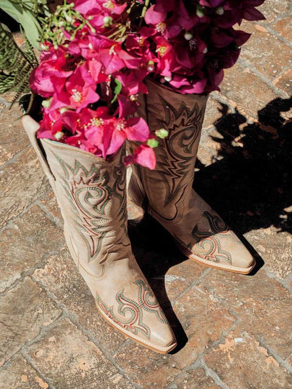 Women's Corral Bone Genuine Leather Boots with Embroidery featuring bone color, intricate red and blue stitched patterns, snip toe, and pull-on straps