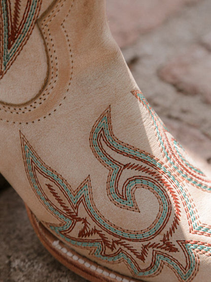 Women's Corral Bone Genuine Leather Boots with Embroidery in bone color featuring intricate red and blue stitched patterns on soft leather