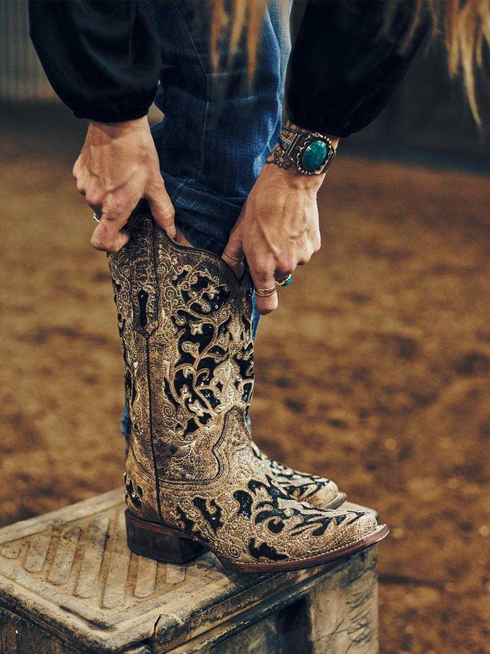 Women's Corral Brown Genuine Leather Boots with Inlay & Flowered embroidery featuring black glitter inlays, studs, and crystals on tall leather shaft