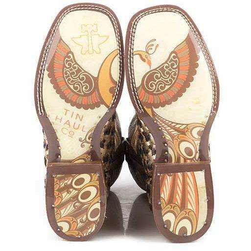 Women's Tin Haul 3D Cross Boots with brown leather soles, colorful peacock-inspired scrollwork and decorative cross emblem