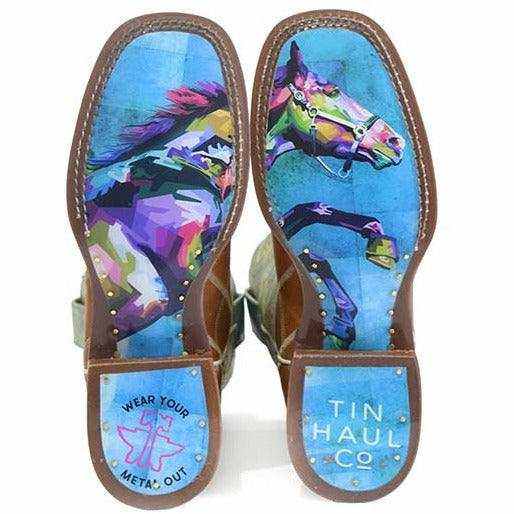 Women's Tin Haul Rhapsody Boots with vivid blue soles, colorful leaping horse artwork, and brown leather trim